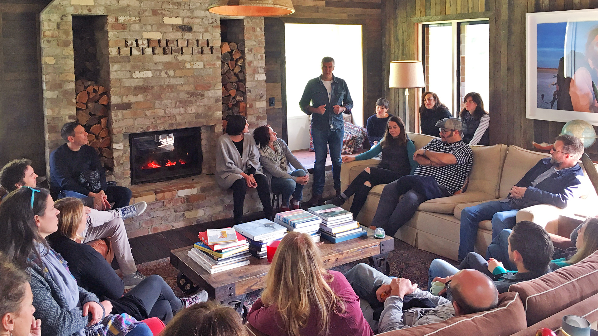 Internal view with Ian Darling speaking to people on couches