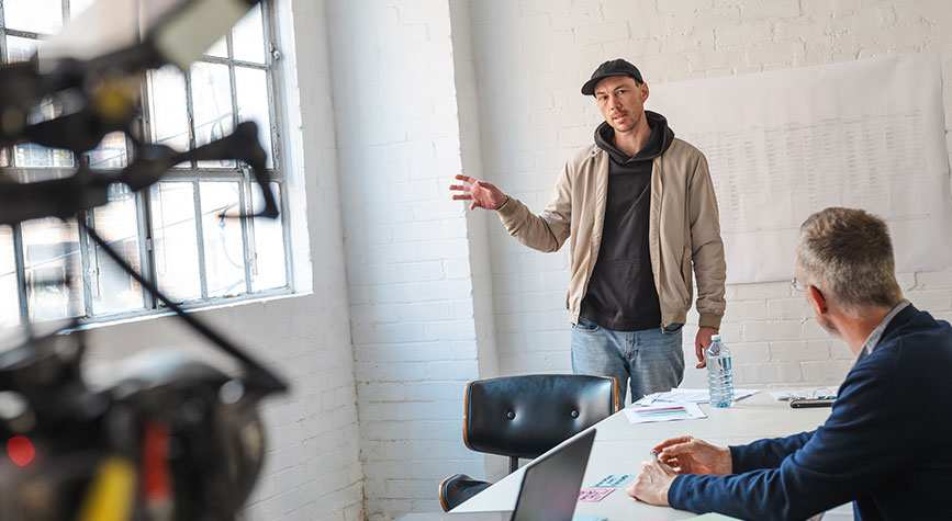 Meeting with 2 people and camera gear